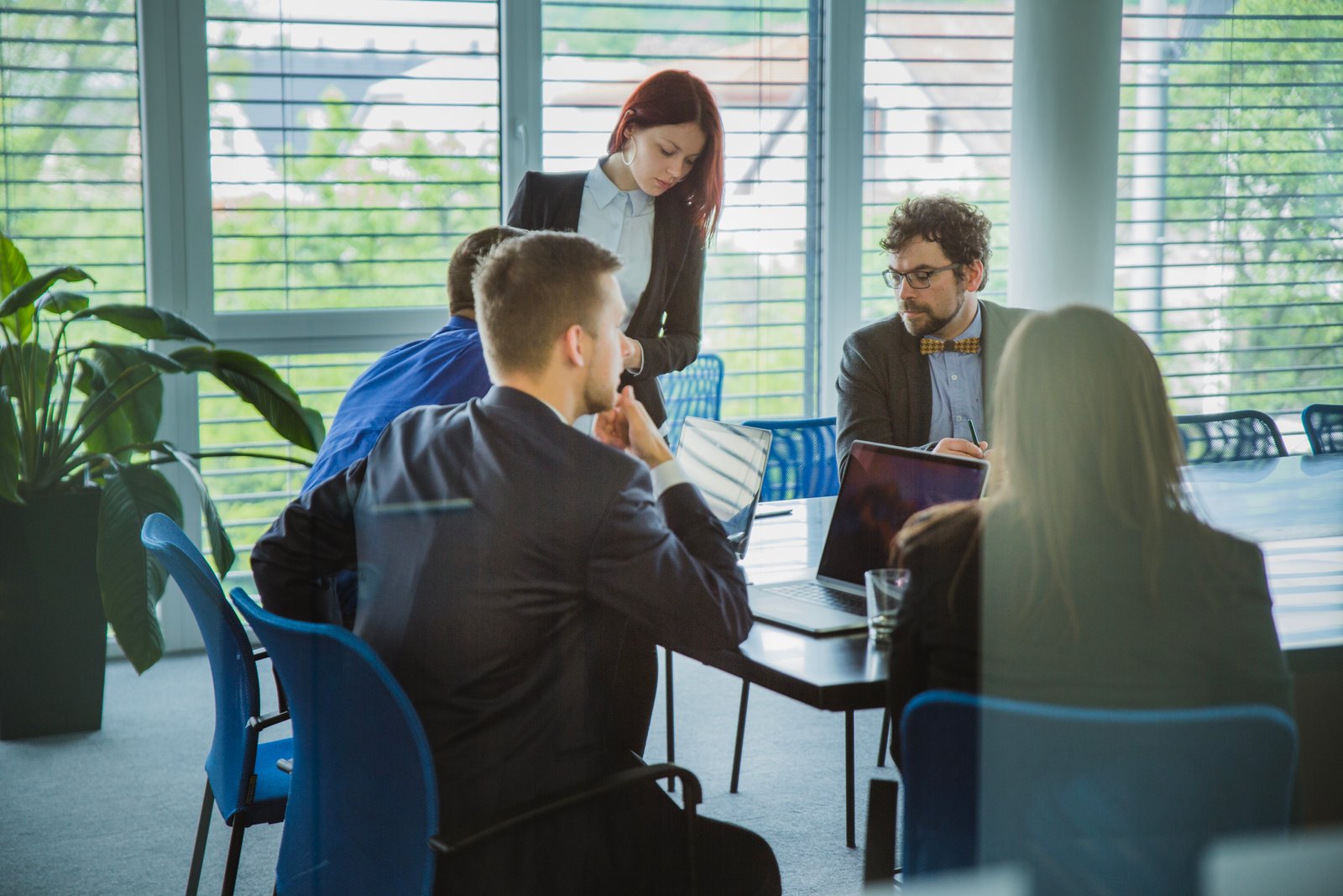 young-coworkers-conference-hall-working